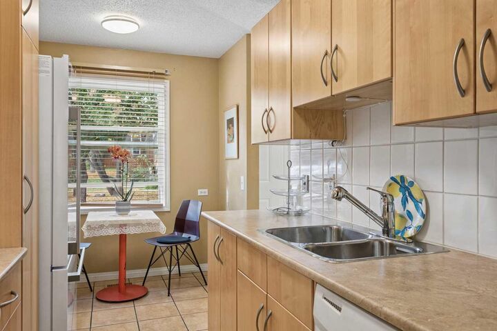 Property Photo:  330 Canterbury Drive SW 23  AB T2W 1H6 