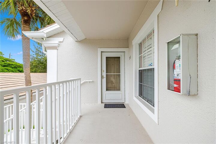 Property Photo: 22701 Sandy Bay Dr 201 FL 33928
