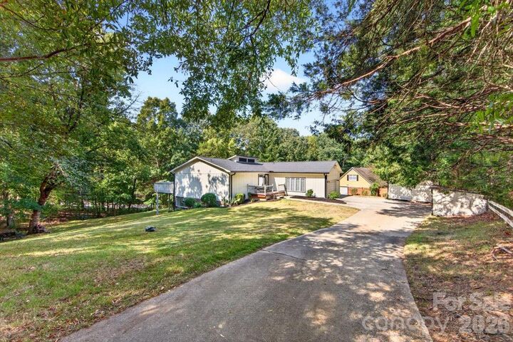 Property Photo:  16 Cove Creek Place SE  NC 28025 