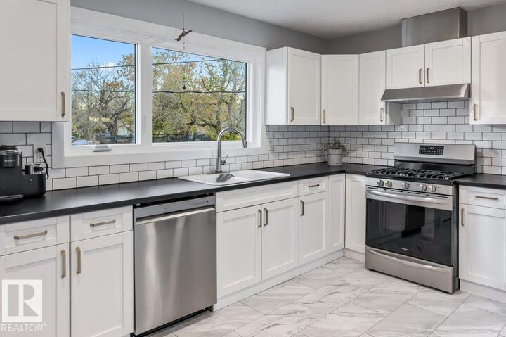 Property Photo: 55 Gladstone Crescent AB T8N 0W6
