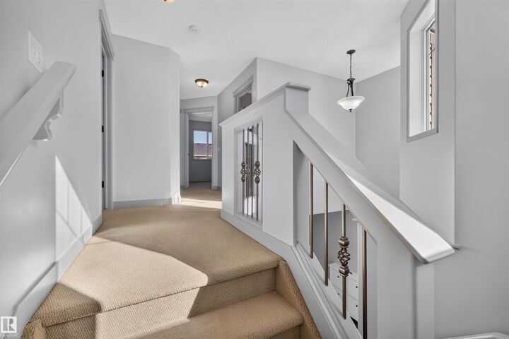 Property Photo:  6116 8 Avenue SW  AB T6X 0G3 