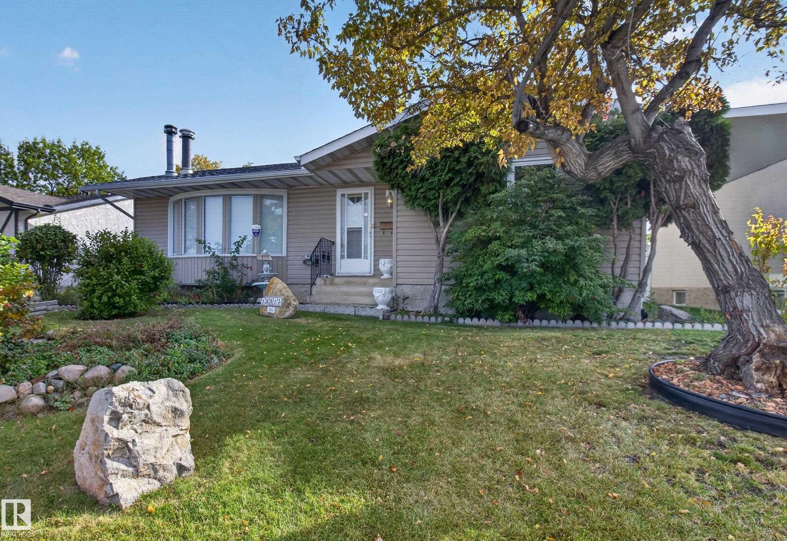 Property Photo:  13315 30 Street NW  AB T5A 3A1 