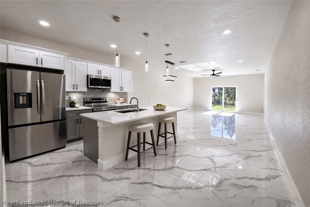 Property Photo: 4816/4818 24th Street SW FL 33973