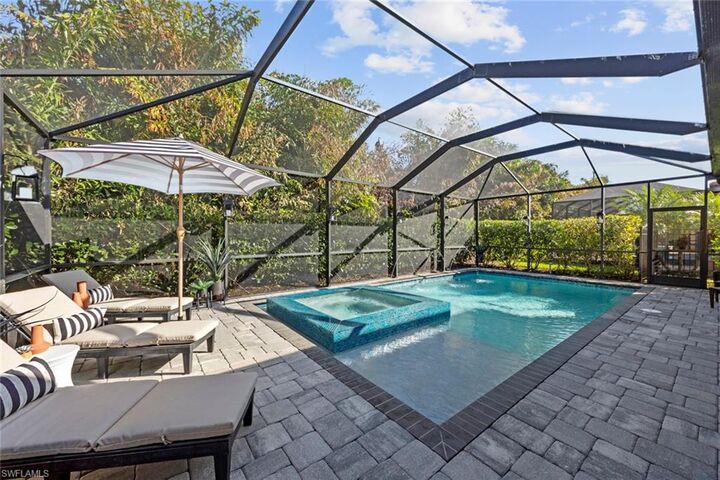 Property Photo: 8712 Westwood Oaks Pl FL 33908