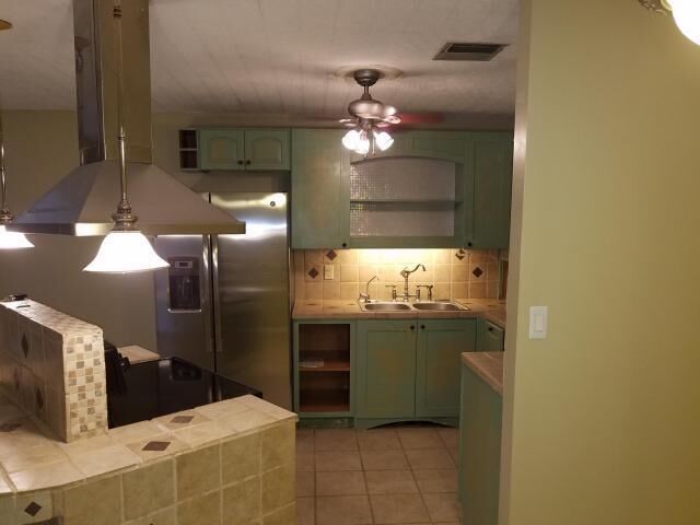 Property Photo:  5725 Fernley Drive E 7  FL 33415 