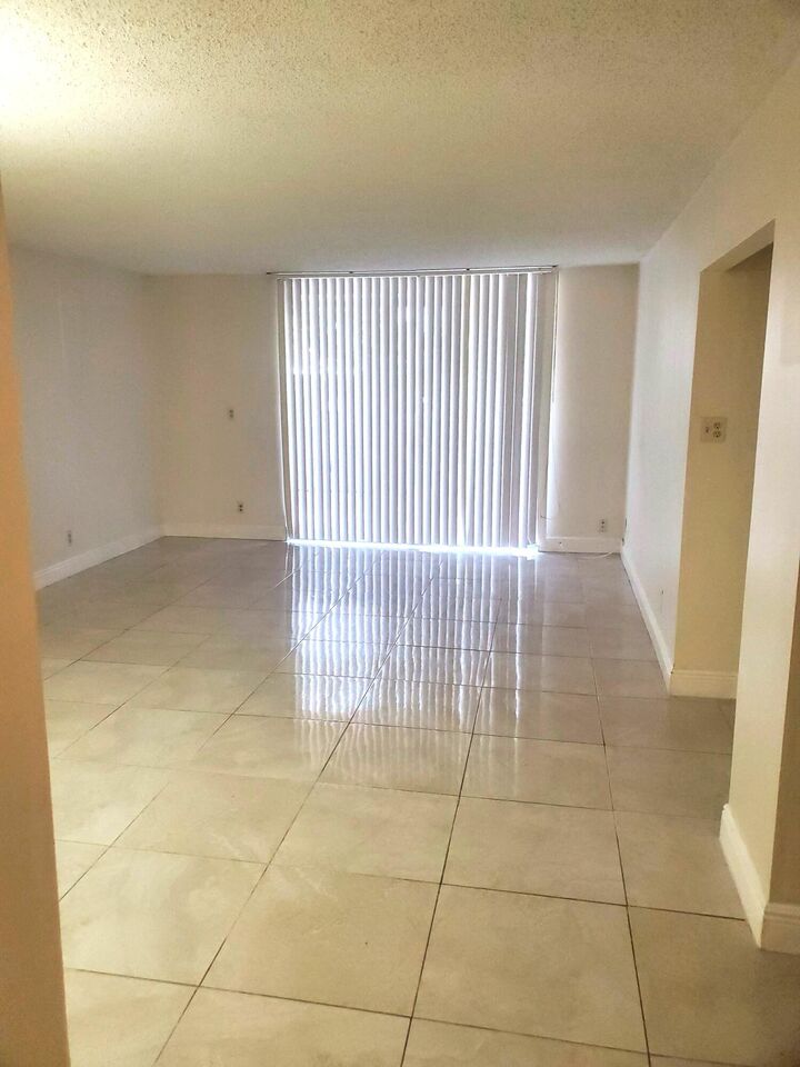 Property Photo:  410 NW 68th Avenue 119  FL 33317 