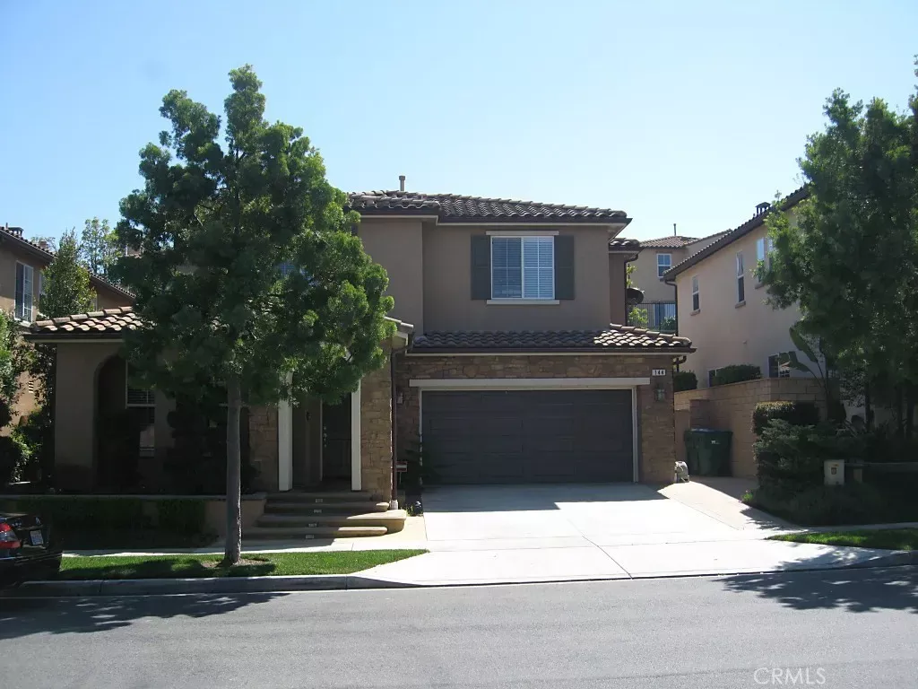 Property Photo:  144 Treehouse  CA 92603 
