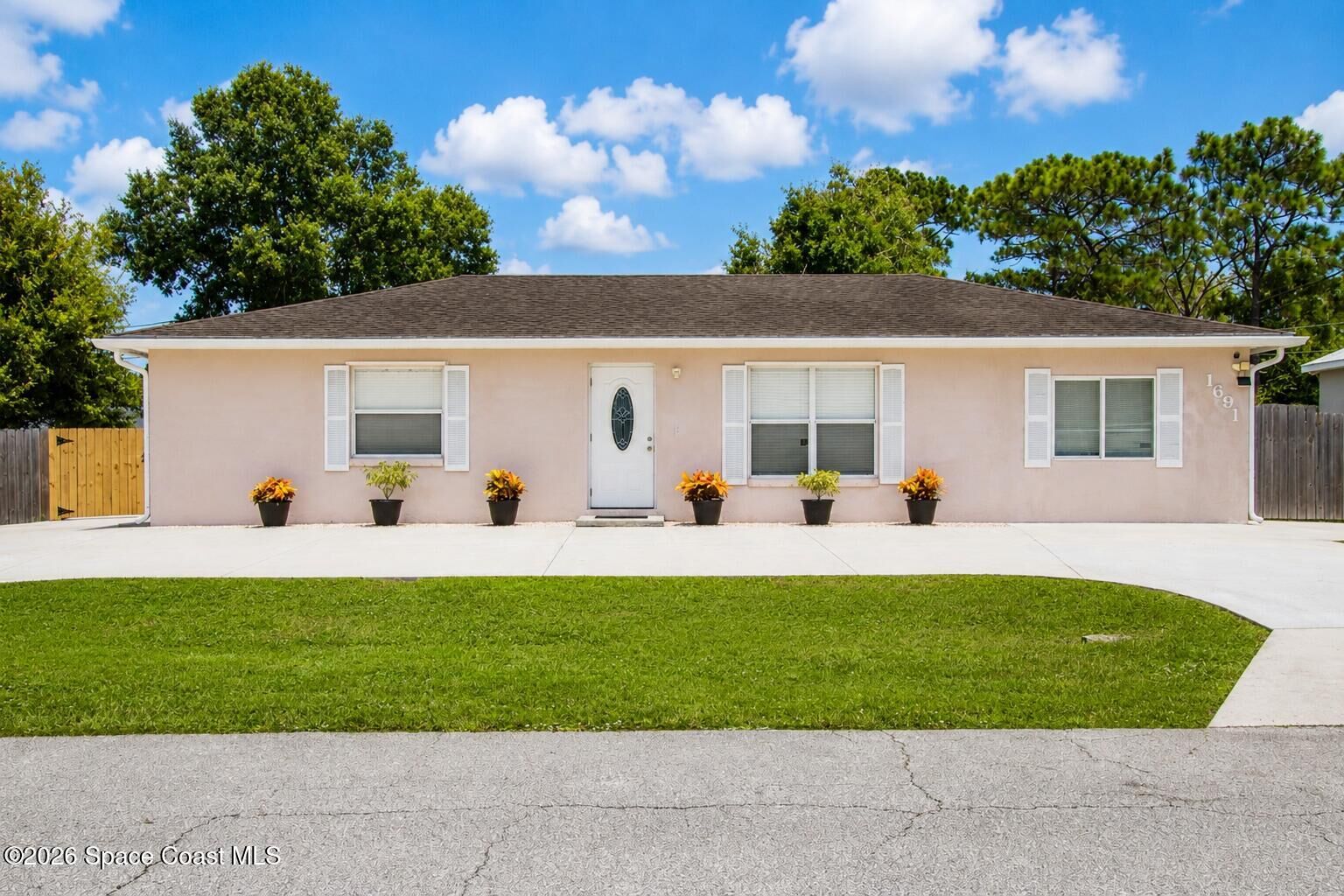 Property Photo:  1691 Burgandy Street SE  FL 32909 