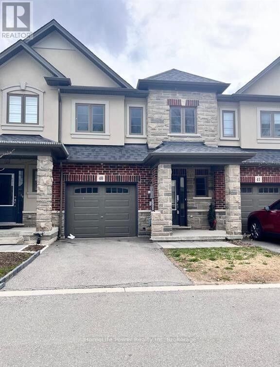 Property Photo:  324 Equestrian Way 40  ON N2E 2M6 