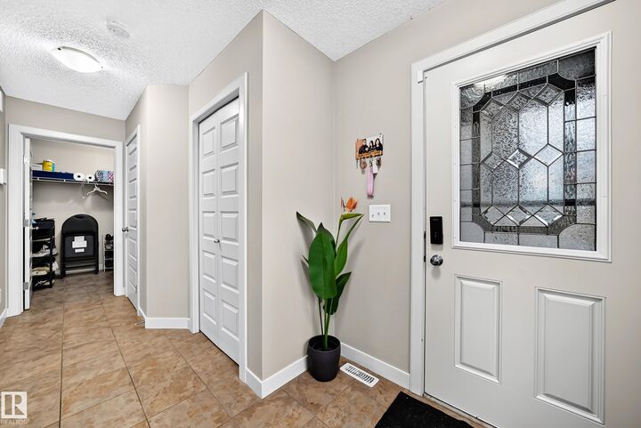 Property Photo:  1673 Cunningham Way SW  AB T6W 0W5 