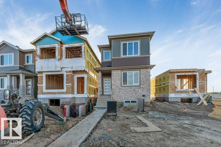 Property Photo:  8416 226 Street NW  AB T5T 7Y8 