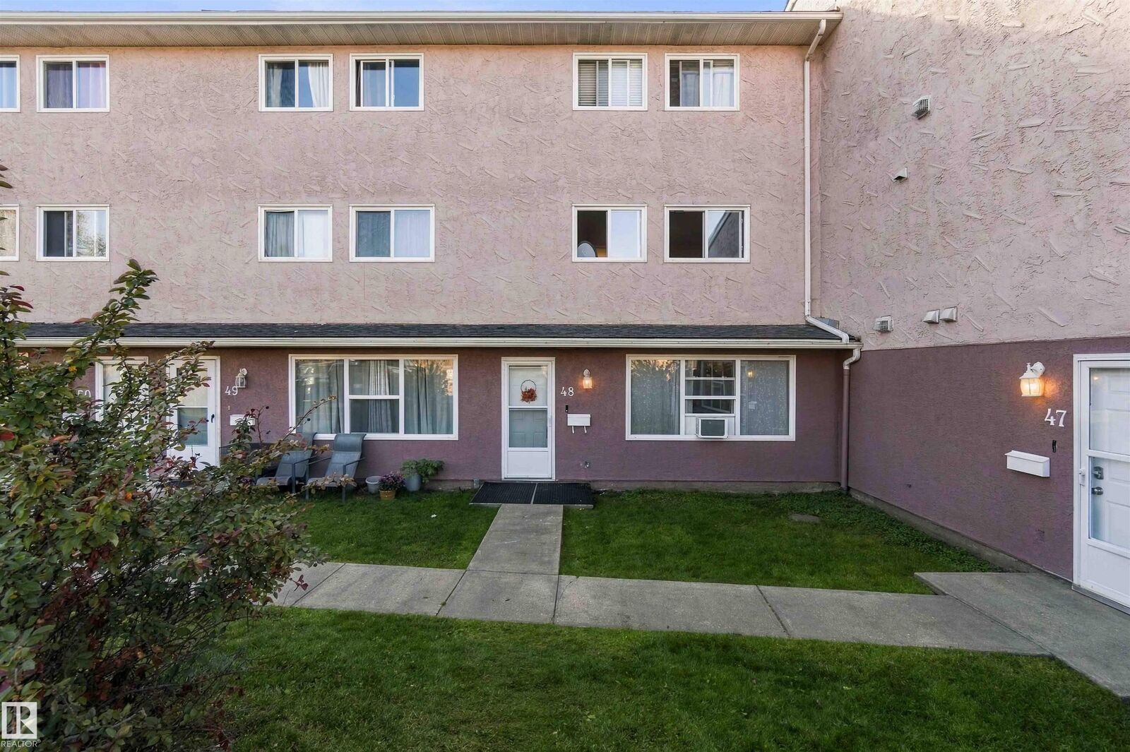 Property Photo:  13590 38 Street NW 48  AB T5A 2W7 