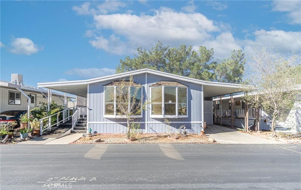 Property Photo:  14000 El Evado Road 91  CA 92392 