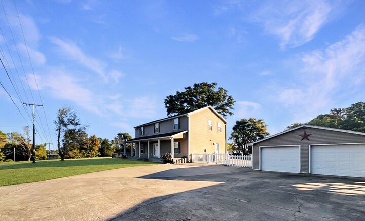Property Photo:  2448 Highway 120  TN 37023 