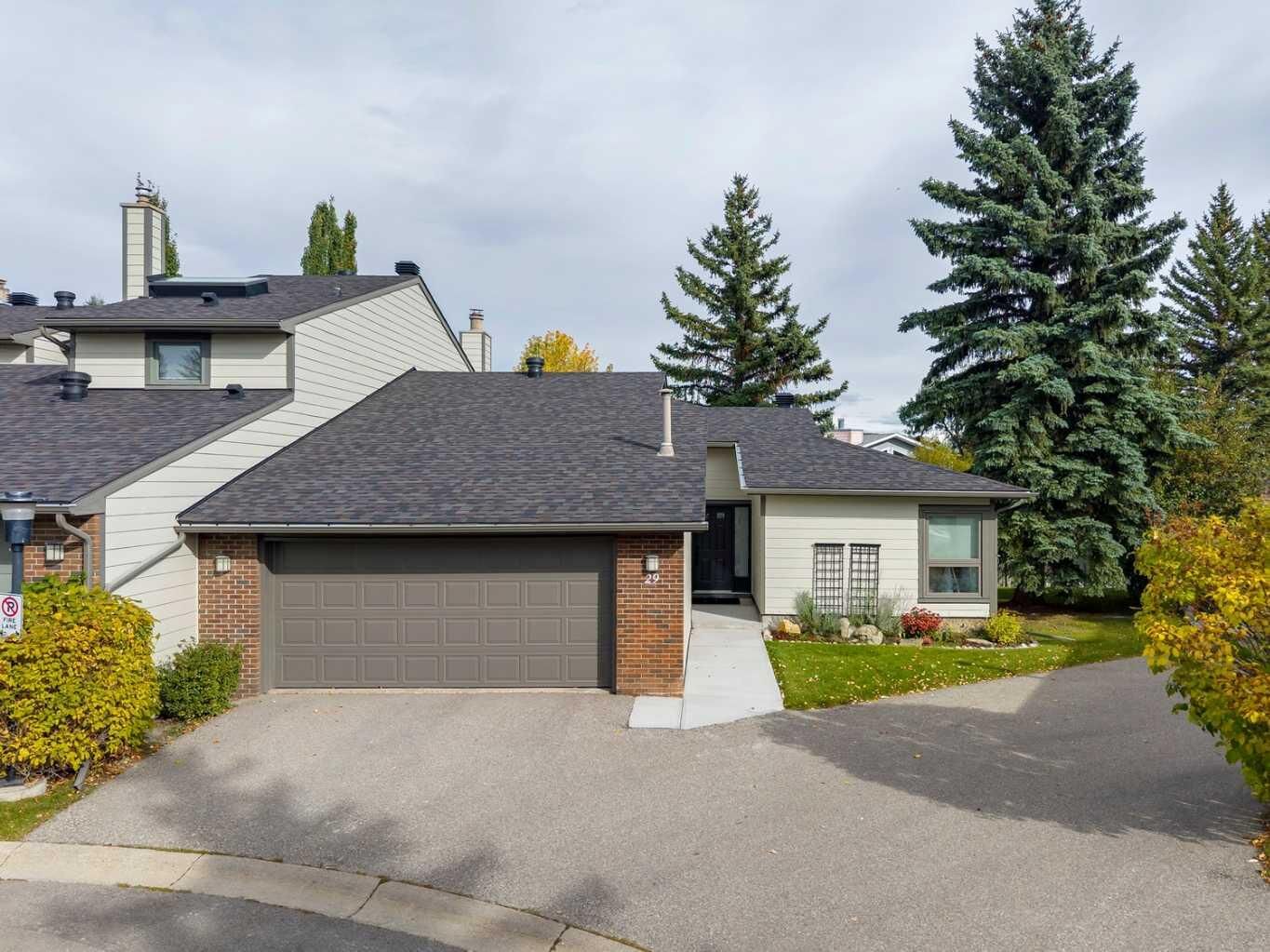 Property Photo:  185 Woodridge Drive SW 29  AB T2W 3X7 
