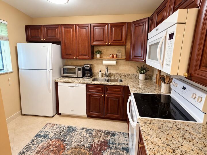 Property Photo:  511 Gardens Drive 203  FL 33069 