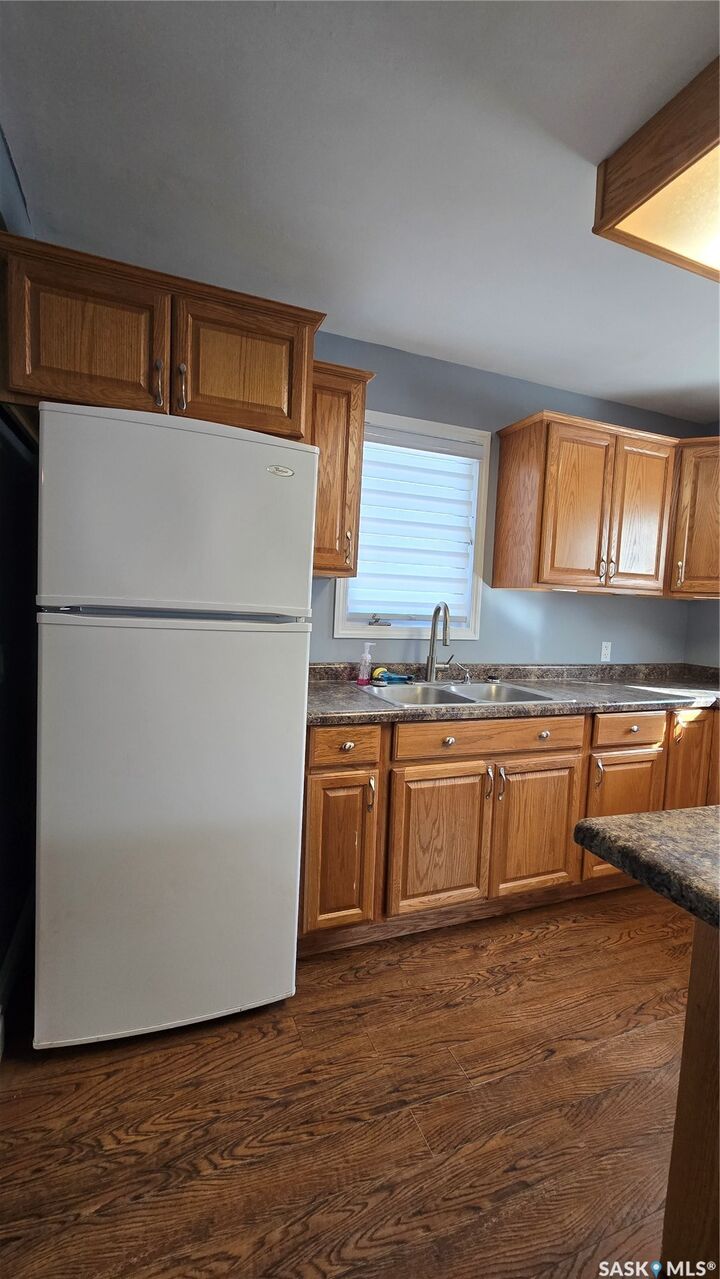 Property Photo:  716 Gregson Street  SK S0C 2B0 