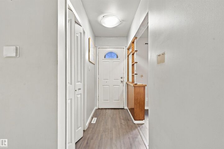 Property Photo:  12303 115 Avenue NW  AB T5M 2Z7 