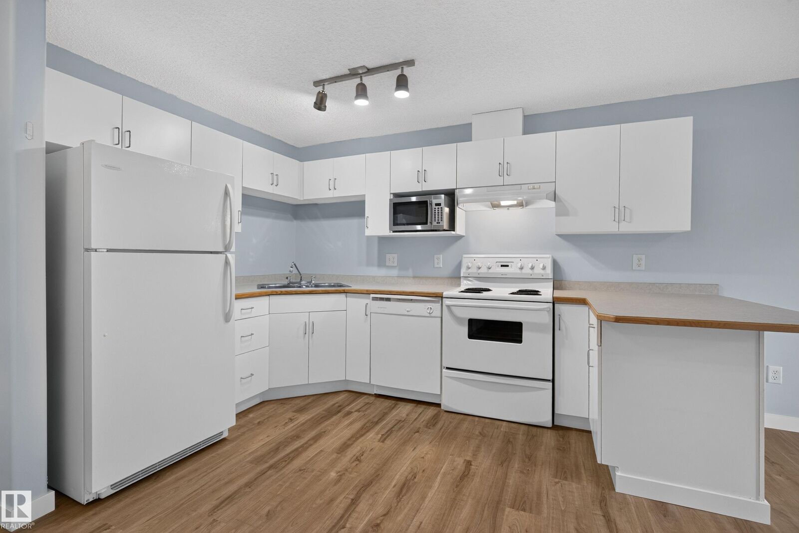 Property Photo:  10535 122 Street NW 118  AB T5N 4B7 