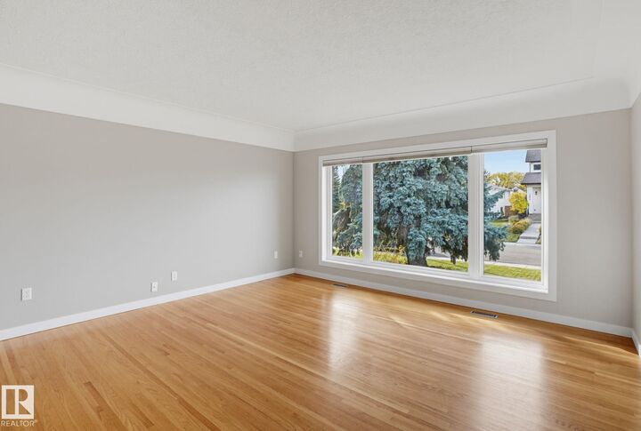 Property Photo:  10807 134 Street NW  AB T5M 1H9 