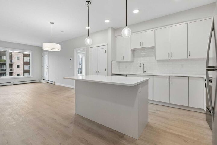 Property Photo:  655 Shawnee Square SW 312  AB T2Y 1E3 