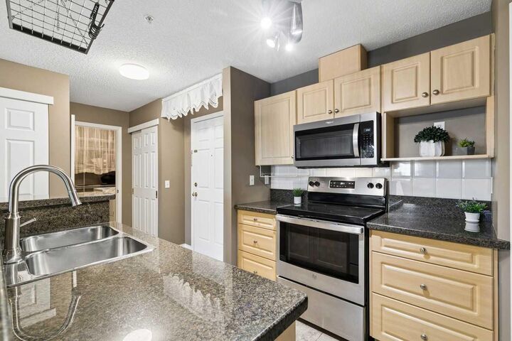 Property Photo:  290 Shawville Way SE 307  AB T2Y 3Z9 