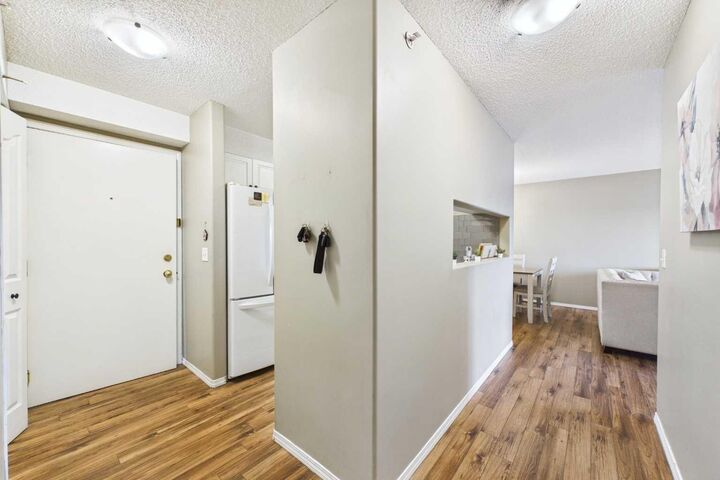 Property Photo:  6224 17 Avenue SE 1414  AB T2A 7X8 