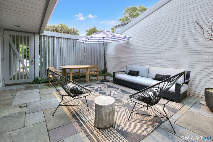 Property Photo:  104 Harvest Commons 104  CT 06880 