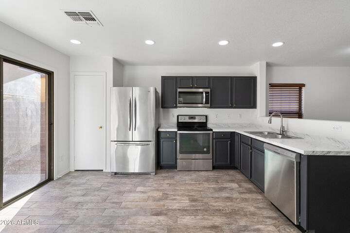 Property Photo:  6425 W Harwell Road  AZ 85339 