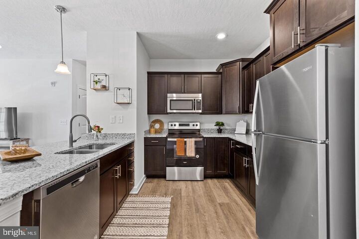 Property Photo:  960 Setting Sun Ln 08-203  PA 17201 