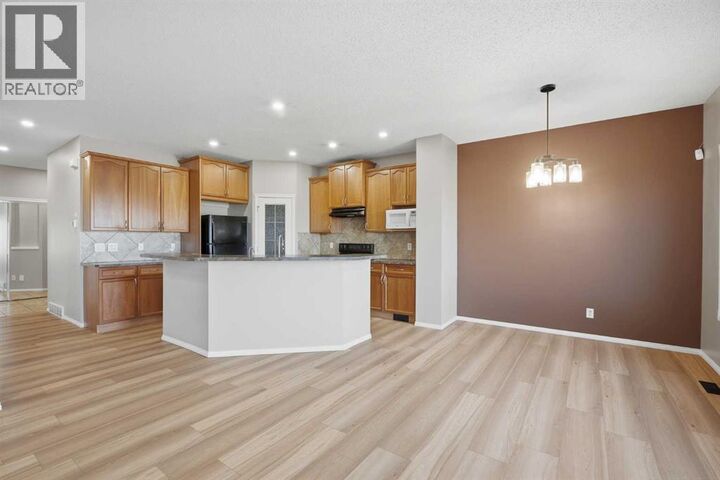 Property Photo: 249 Saddlecrest Way Northeast AB T3J 5N3