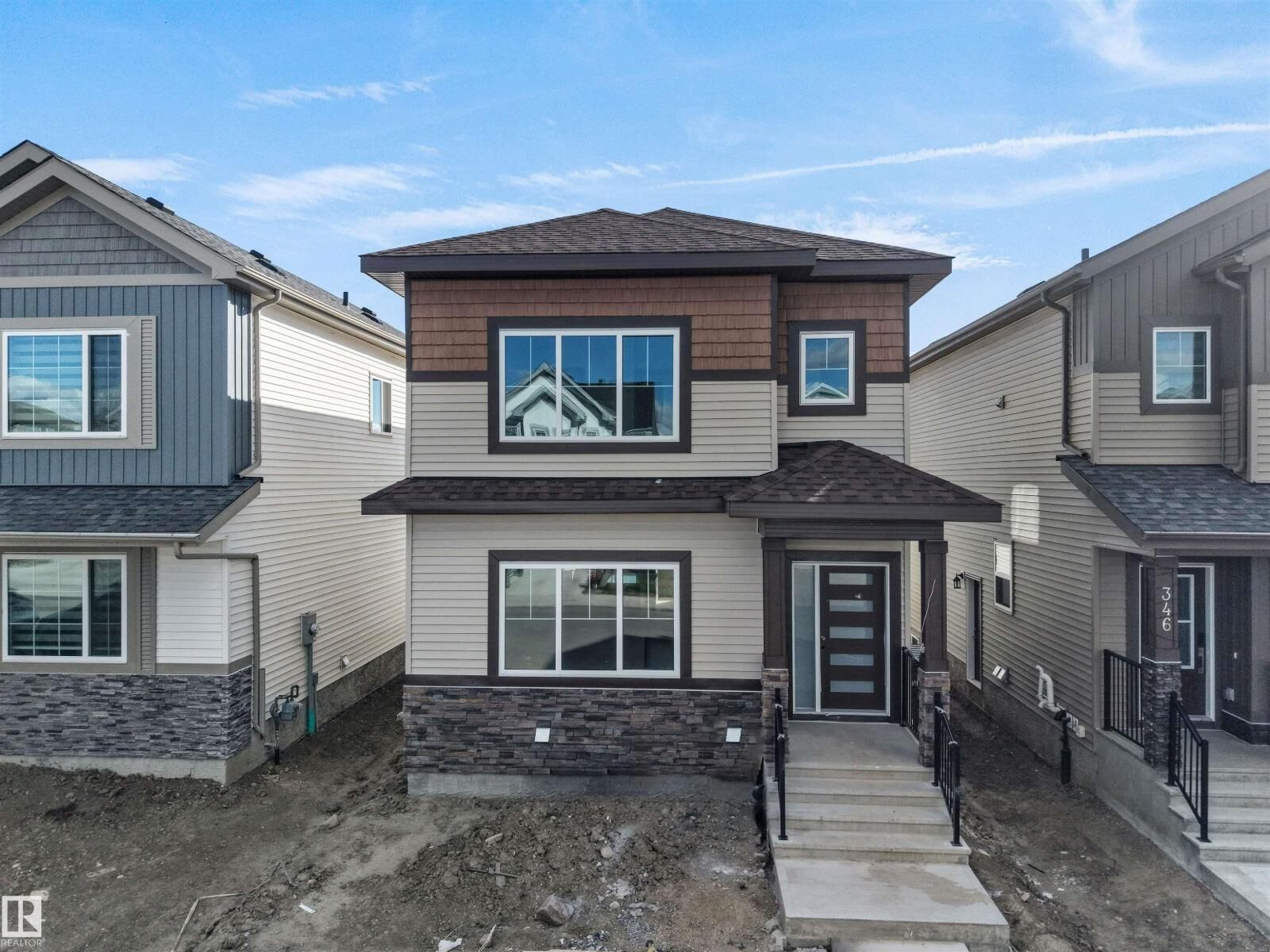 Property Photo: 348 Roberts Wd AB T9E 1P8