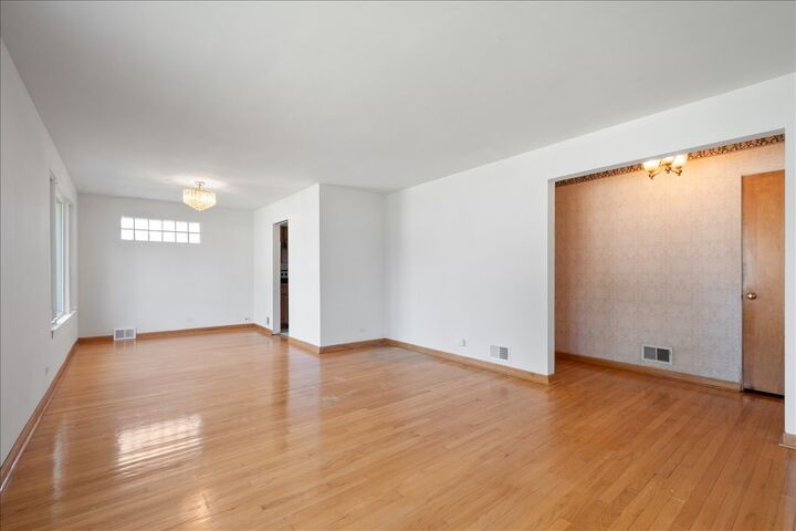 Property Photo:  8449 N St. Louis Avenue  IL 60076 