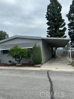 Property Photo:  8509 94 Beverly Blvd.  CA 90660 