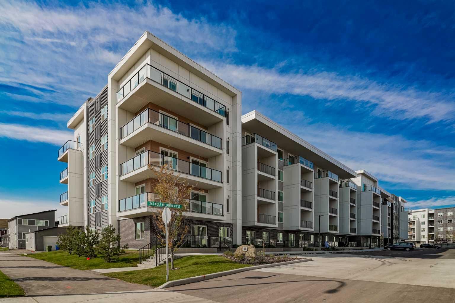 Property Photo:  265 Wolf Willow Boulevard SE 2120  AB T2X 6P9 