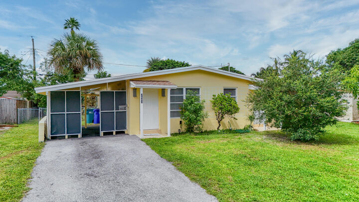 Property Photo:  2647 NW 62nd Avenue  FL 33063 