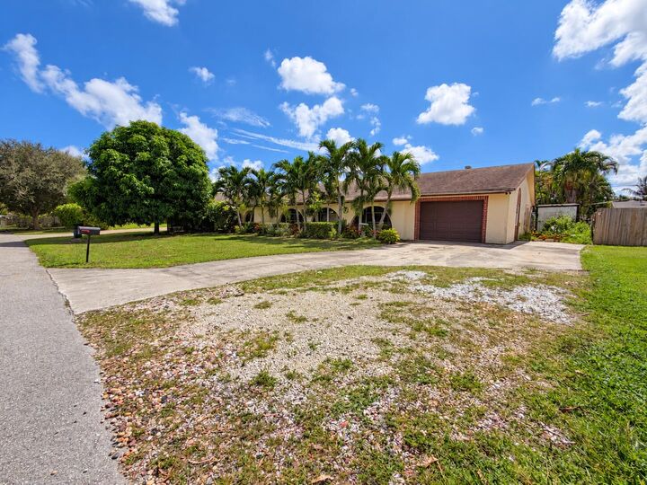 Property Photo: 3464 Artesian Drive FL 33462