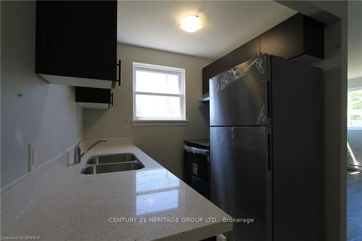 Property Photo:  116 King Edward Avenue 7  ON N5Z 3T1 