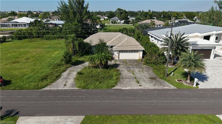 Property Photo:  209 SE 28th Ter  FL 33904 