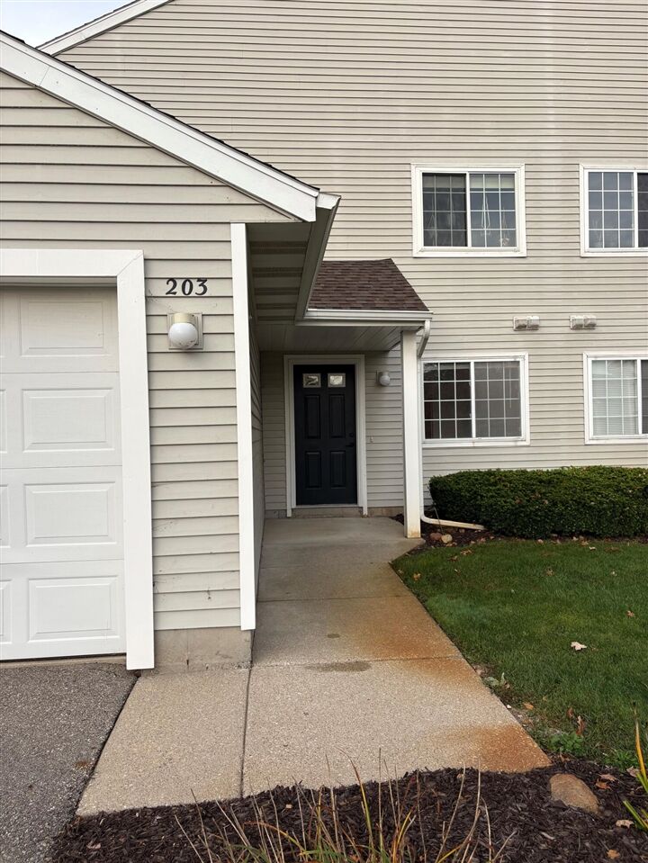 Property Photo:  203 Hunters Lane  MI 49341-1355 