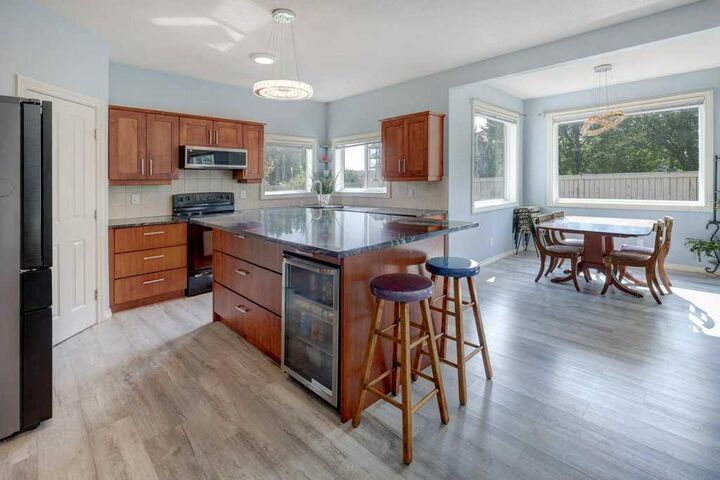 Property Photo:  242 Crystal Green Point  AB T1S 2K7 