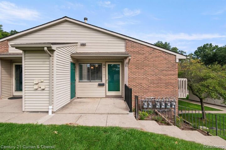 Property Photo: 403 Spring Brooke Drive MI 48116