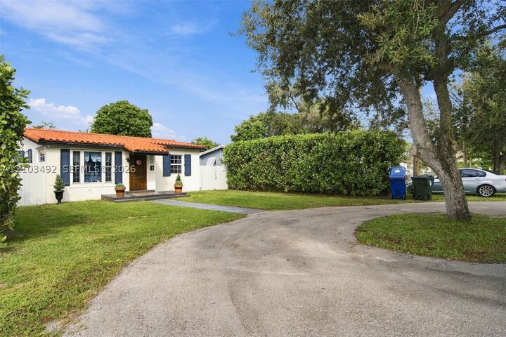 Property Photo:  208 Iroquois St  FL 33166 