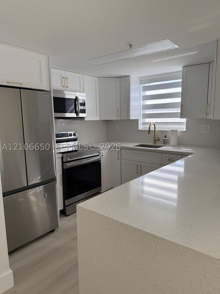 Property Photo:  3052 SW 27th Ave 302  FL 33133 