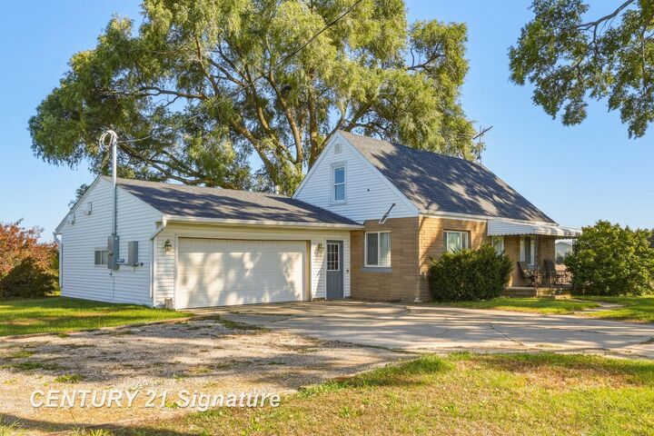 Property Photo: 12265 E Washington Road MI 48757