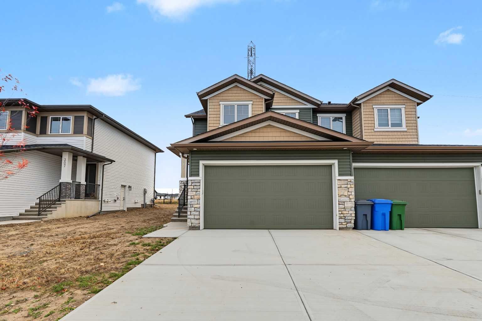 Property Photo:  311 Dawson Dock Way  AB T1X 2W4 