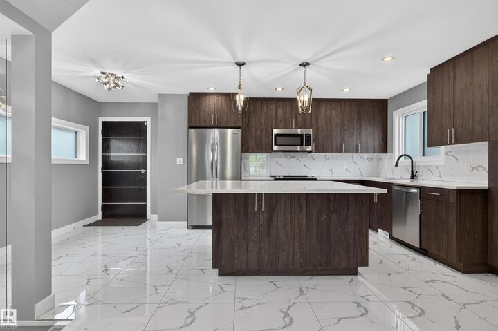 Property Photo:  9526 109A Avenue NW  AB T5H 1G3 