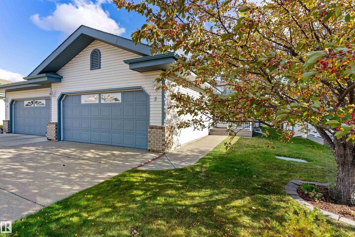 Property Photo: 17418 98A Avenue NW 5 AB T5T 6G2