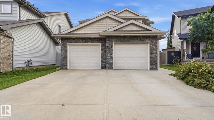 Property Photo: 6035 4 Avenue SW AB T6X 0J8