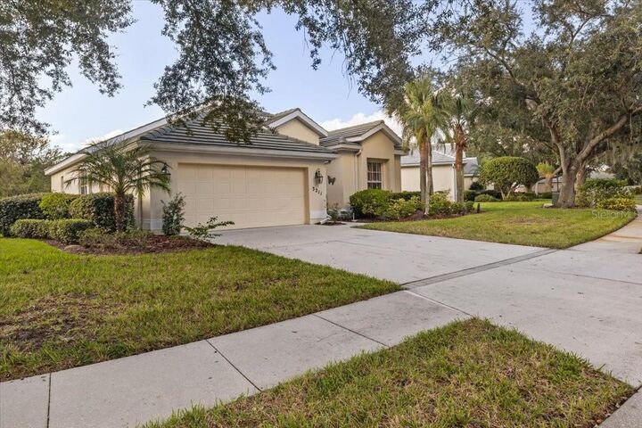 Property Photo:  3211 Woodland Fern Drive  FL 34219 